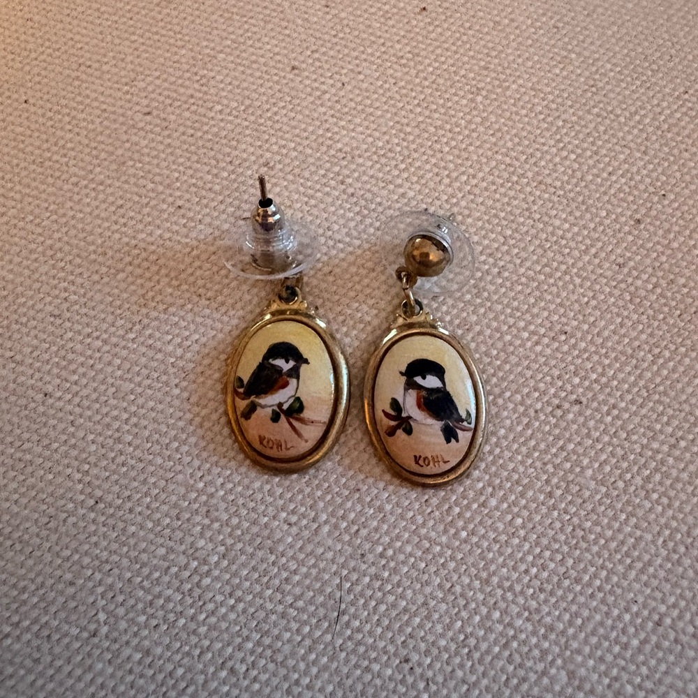 Vintage-style dangle earrings featuring an illustrated black-capped chickadee